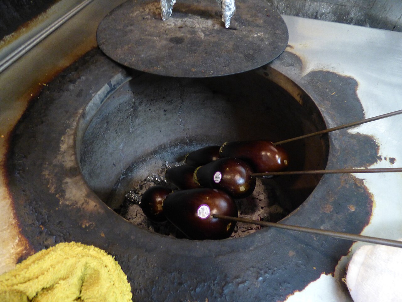 Stock photo of Starr-180406-0718-Solanum melongena-in tandoor oven-Kamana Kitchen Hilo-Hawaii (39559959180).jpg for Canoga Park, not a photo of a listed shop